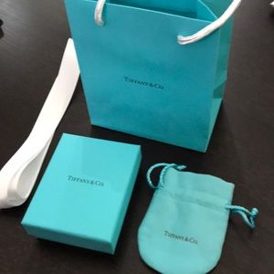 Tiffany’s pouch, box, bag, and ribbon